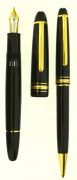 MONTBLANC	Parure plume 146 et bille 164 Meisterstück. Résine noire et attributs plaqués or. Plume or 18 carats large, remplissage pi...