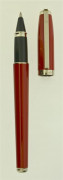 DUPONT Stylo roller Fidelio. Laque rouge et attributs palladium. Dans un écrin.