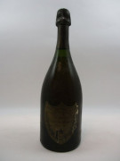 1 bouteilles CHAMPAGNE DOM PERIGNON 1969 (légèrement bas