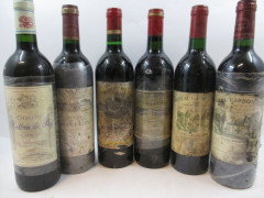 12 bouteilles 2 bts : CHÂTEAU CARBONNIEUX 1988 CC Pessac Leognan (étiquettes très abimées)