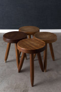 Charlotte PERRIAND (1903-1999) Ensemble de quatre tabourets hauts dits "Berger" - Circa 1950 Piètement et assise en bois massif