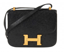 HERMÈS  Sac CONSTANCE 23 Autruche noir (Struthio Camelus) NR Garniture métal plaqué or  CONSTANCE 23 bag Black ostrich...