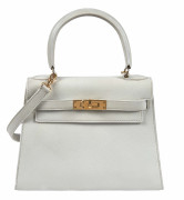 HERMÈS 1988  Sac KELLY Sellier 20 Veau Swift blanc Garniture métal plaqué or  KELLY Sellier 20 bag White Swift calfs...