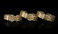 HERMÈS  Trois bracelets RAPHIA RUMBA Or jaune 18K, diamants Poids total : 166 g  Three RAPHIA RUMBA bracelets Yellow g...