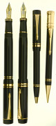 PARKER Ensemble 2 plumes Centenial + 1 bille + 1 mine de la collection Duofold. Résine noire et attributs plaqués or. Plumes or 18...