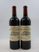 12 bouteilles CHÂTEAU HAUT MARBUZET 2009 Saint Estèphe (étiquettes léger tachées)