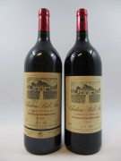 2 magnums 1 mag :   CHÂTEAU BELAIR 1994 Lussac Saint Emilion (étiquette léger tachée)