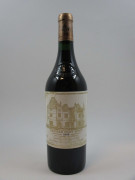 1 bouteille CHÂTEAU HAUT BRION 1986 1er GC Pessac Léognan (étiquette léger abimée