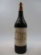 1 bouteille CHÂTEAU HAUT BRION 1987 1er GC Pessac Léognan (étiquette sale