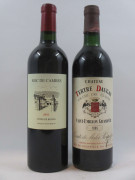 10 bouteilles 3 bts : CHÂTEAU ROC DE CAMBES 2010 Côtes de Bourg 7 bts : CHÂTEAU TERTRE DAUGAY 1985 GC Saint Emilion (légèrement bas éti