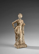 GRÈCE, PROBABLEMENT ATELIER DE TANAGRA, 4e - 3e SIECLE AV. J.C.  Statuette féminine en terre cuite