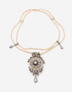 MELLERIO DITS MELLER  Collier et broche-pendentif or, argent, platine, perles, diamants, fin du XIXème s. A pearl, diamond, silver, g