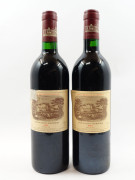 2 bouteilles CHATEAU LAFITE ROTHSCHILD 1986 1er GC Pauillac (étiquettes abimées, déchirées, 1 léger décollée