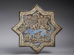 ÉTOILE DE REVÊTEMENT LUSTRÉE AU RENARD  Iran, probablement Kashan, art ilkhanide, deuxième moitié 13e-début 14e siècle