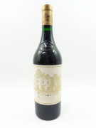 1 bouteille CHÂTEAU HAUT BRION 1985 1er GC Pessac Léognan (étiquette sale et tachée)