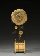 PENDULE AU TOURNESOL D'ÉPOQUE CHARLES X