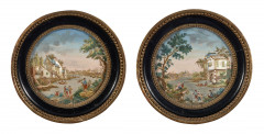 PAIRE DE MÉDAILLONS DE LA DEUXIÈME MOITIÉ DU XVIIIe SIÈCLE Attribués à Thomas Compigné "Paysages au bord de la rivière"