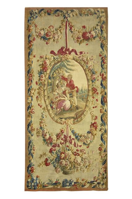 SUITE DE SEPT TAPISSERIES DE BEAUVAIS D'EPOQUE LOUIS XVI En laine, chaque panneau de forme rectangulaire sur fond crème orné au centre