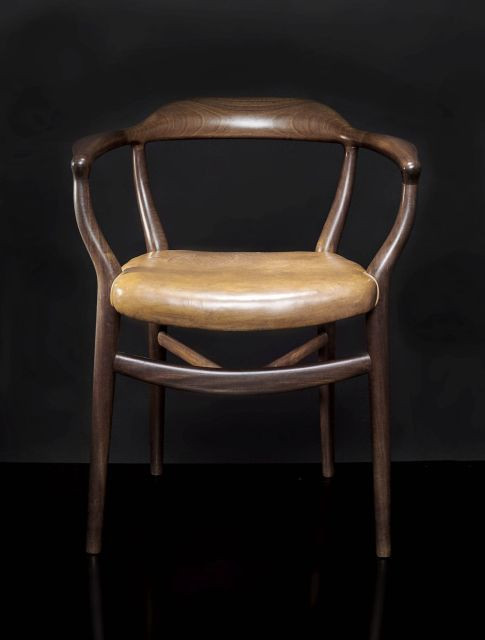 Finn JUHL (1912-1989) Rare fauteuil Mod. NV-44 dit "Bone Chair" - 1944 Structure en teck, revêtement en cuir d'origine cognac