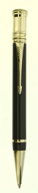 PARKER	Stylo bille Duofold. Résine noire et attributs plaqués argent. Sortie de bille par quart de tour. Dans un écrin.