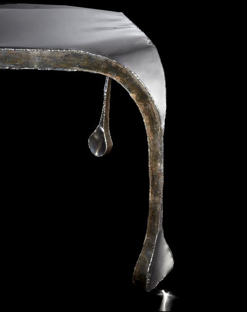 Ron ARAD Né en 1951 Table "Light Table" - 1989 Piètement en acier patiné, plateau en acier poli miroir