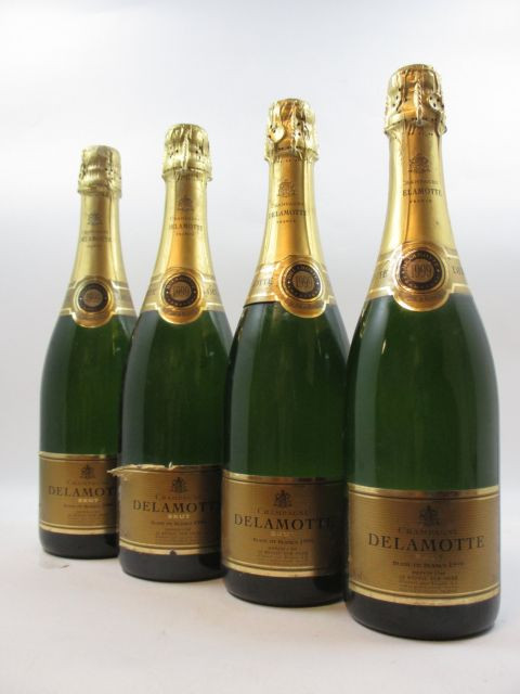 4 bouteilles CHAMPAGNE DELAMOTTE 1999 Blanc de Blancs (étiquettes abimées) (Cave 1)