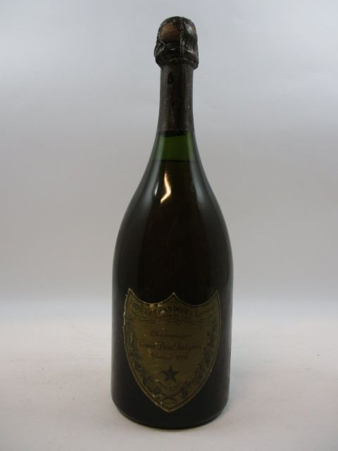 1 bouteilles CHAMPAGNE DOM PERIGNON 1966 (légèrement bas