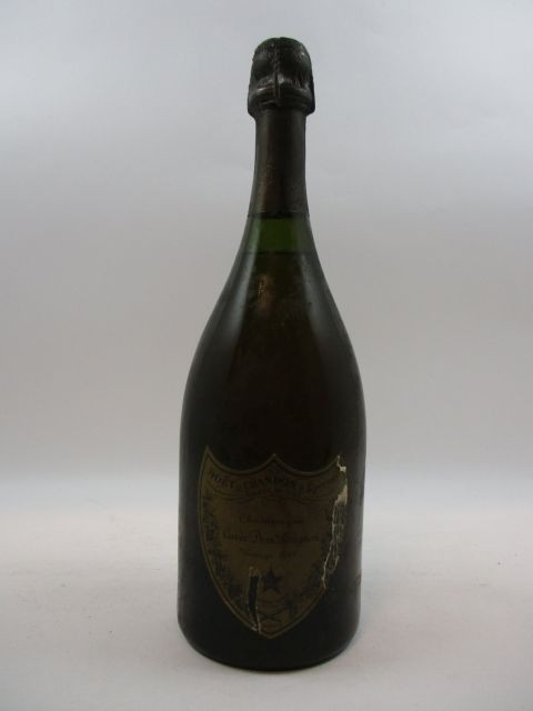 1 bouteilles CHAMPAGNE DOM PERIGNON 1969 (légèrement bas