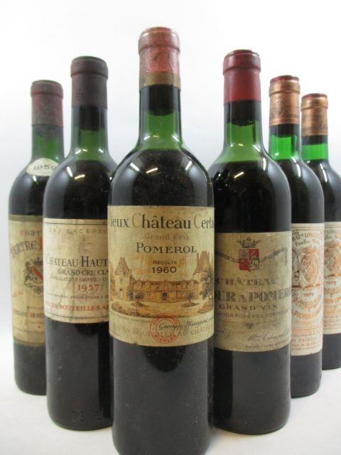6 bouteilles 1 bt : CHÂTEAU HAUT BAILLY 1957 CC Pessac Léognan (haute épaule, étiquette abimée, tampon nicolas)