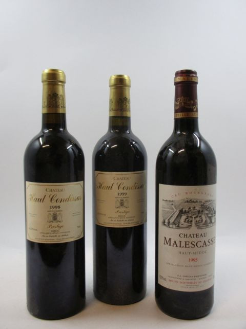 12 bouteilles 4 bts : CHÂTEAU MALESCASSE 1995 Haut Médoc (étiquettes fanées)