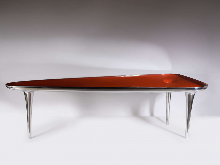 Marc NEWSON (Né en 1963) Table dite "Black Hole Chop Top" - 2004 Piètement et structure en aluminium poli, aluminium laqué orange, p...