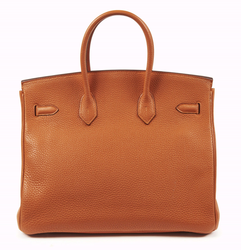 HERMÈS 2007  Sac BIRKIN 35 Taurillon Clémence orange Garniture métal argenté palladié  BIRKIN 35 bag Orange Clémence...