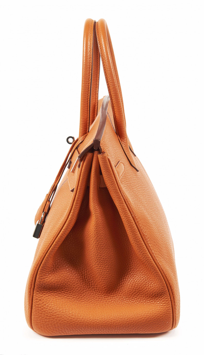 HERMÈS 2007  Sac BIRKIN 35 Taurillon Clémence orange Garniture métal argenté palladié  BIRKIN 35 bag Orange Clémence...
