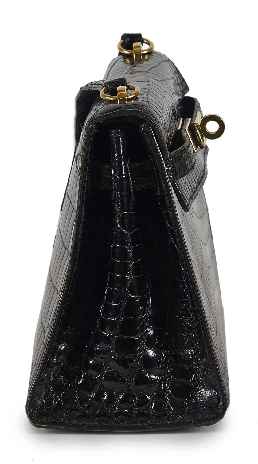 HERMÈS 1985  Sac KELLY Sellier 20 Crocodile du Nil noir (Crocodylus niloticus) II/B Garniture métal plaqué or  KELLY S...