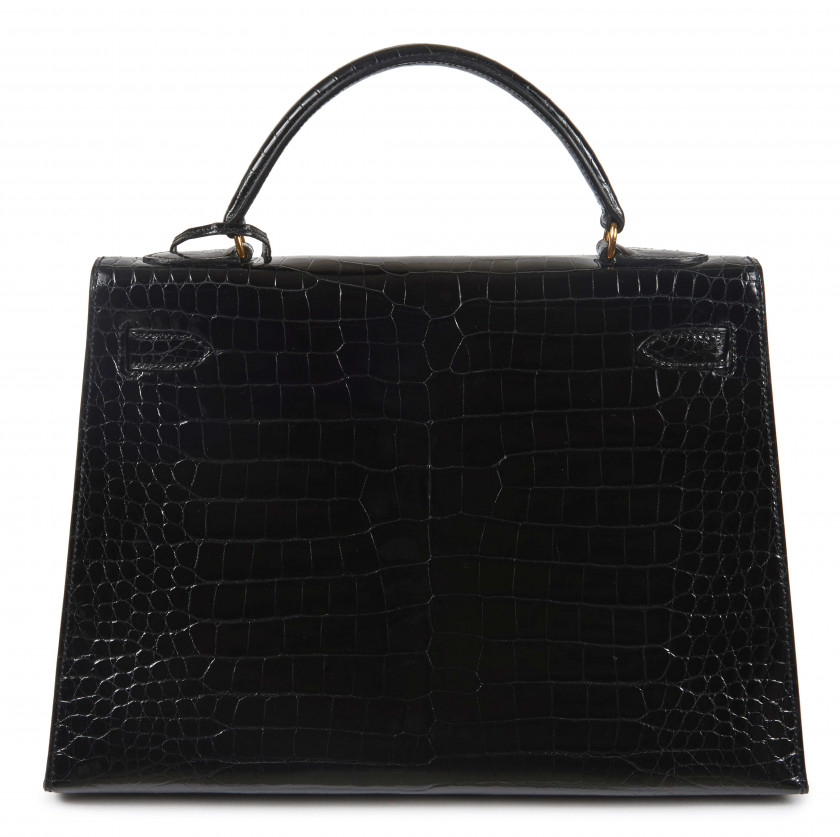 HERMÈS  Sac KELLY Sellier 32 Crocodile d'estuaire noir (Crocodylus porosus) II/B Garniture métal plaqué or  KELLY Sellie...