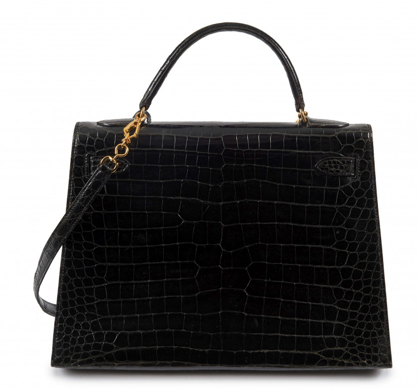 HERMÈS 1985  Sac KELLY Sellier 32 Crocodile d'estuaire noir (Crocodylus porosus) II/B Garniture métal plaqué or  KELLY...