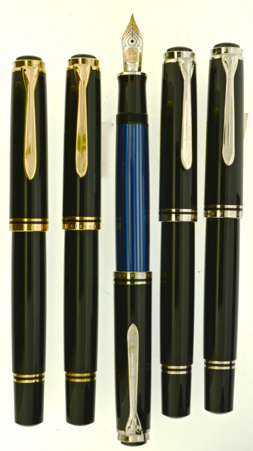 PELIKAN Lot de 5 stylos plume : deux M800 noir et or + deux M805 noir et rhodié + un M805 bleu et rhodié. Plumes or 18 carats, rem...