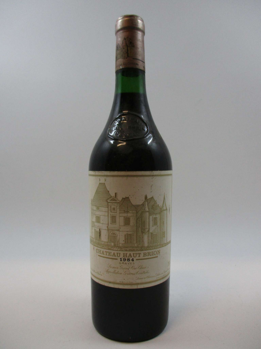 1 bouteille CHÂTEAU HAUT BRION 1984 1er GC Pessac Léognan (étiquette sale
