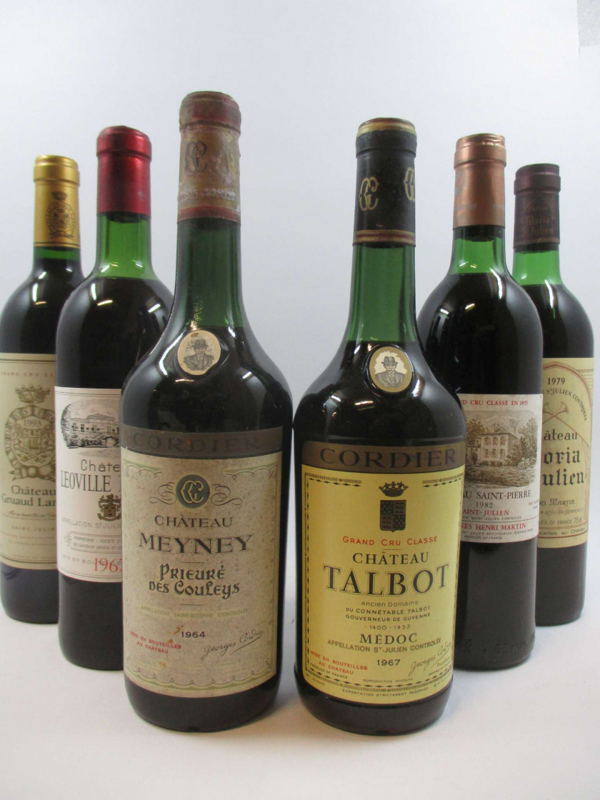9 bouteilles 2 bts : CHÂTEAU TALBOT 1967 4è GC Saint Julien (1 à 5 cm, 1 à 3 cm, capsules légèrement abimées)