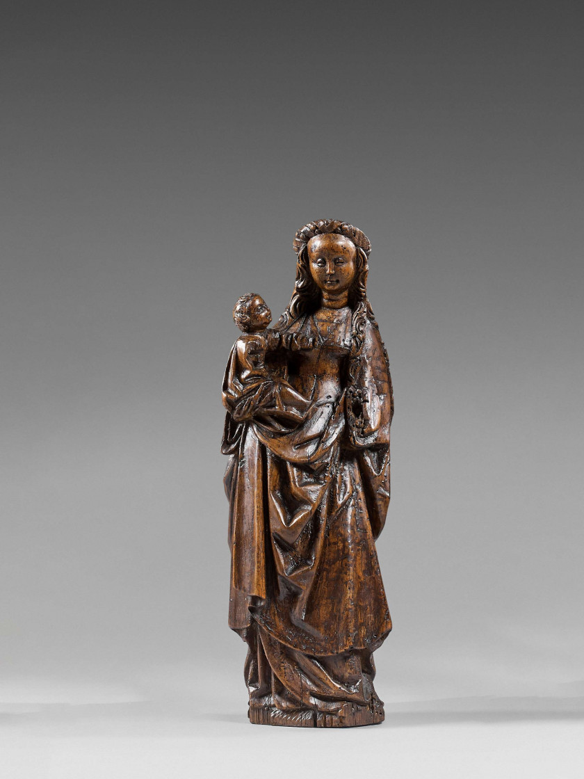 Pays-Bas méridionaux, Malines, début du XVIe siècle  La Vierge à l'Enfant Statuette d'applique en noyer ciré et teinté, autrefois po.