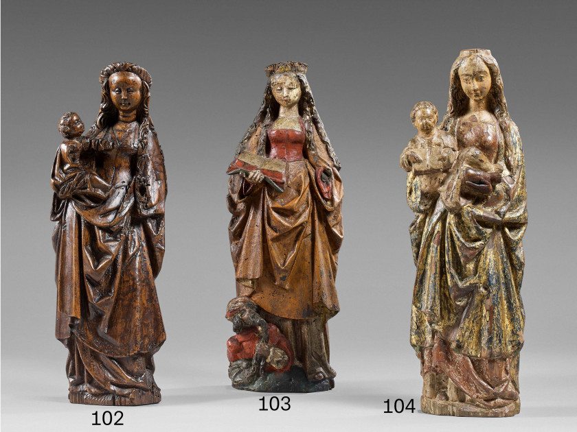 Pays-Bas méridionaux, Malines, début du XVIe siècle  La Vierge à l'Enfant Statuette d'applique en noyer ciré et teinté, autrefois po.