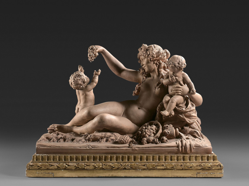 Ecole française de la fin du XIXe siècle D'après Joseph-Charles Marin Bacchante couchée jouant avec deux putti Terre cuite patinée