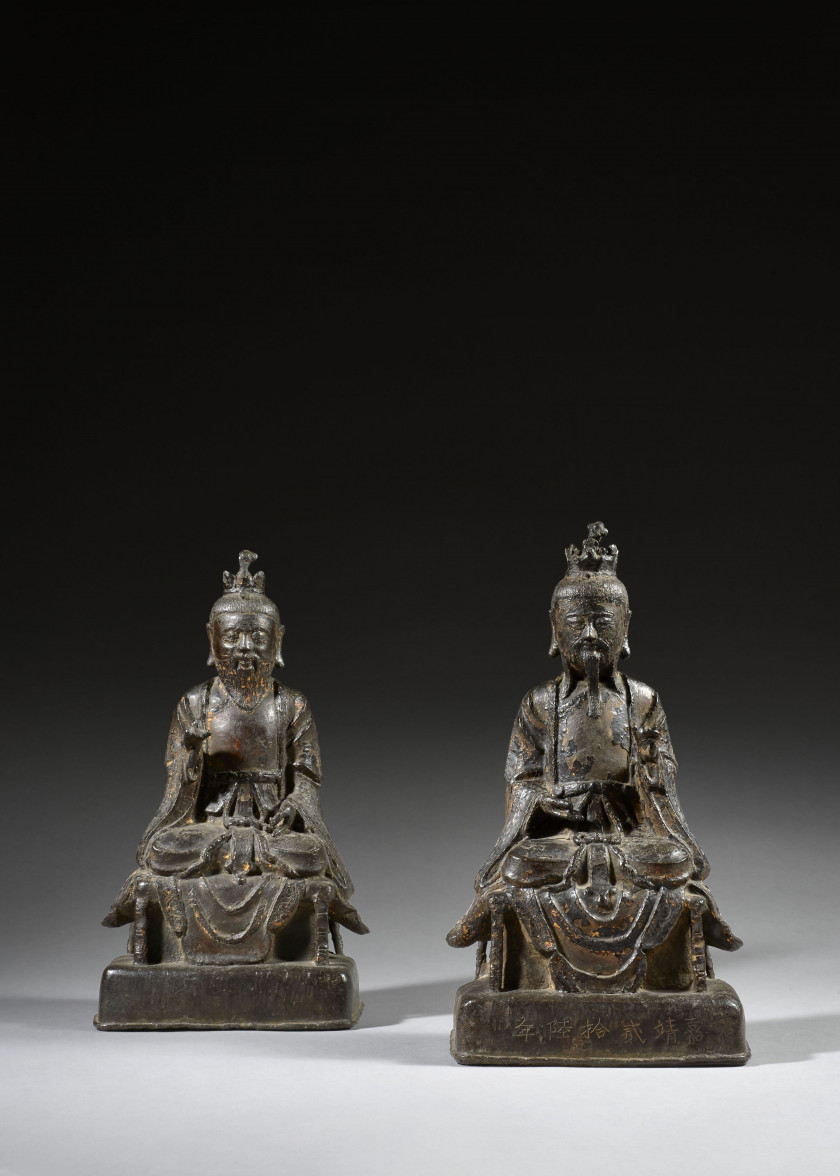 DEUX STATUES D'IMMORTELS TAOÏSTES EN BRONZE LAQUÉ, Chine, dynastie Ming, datées d'époque Jiajing, 1547