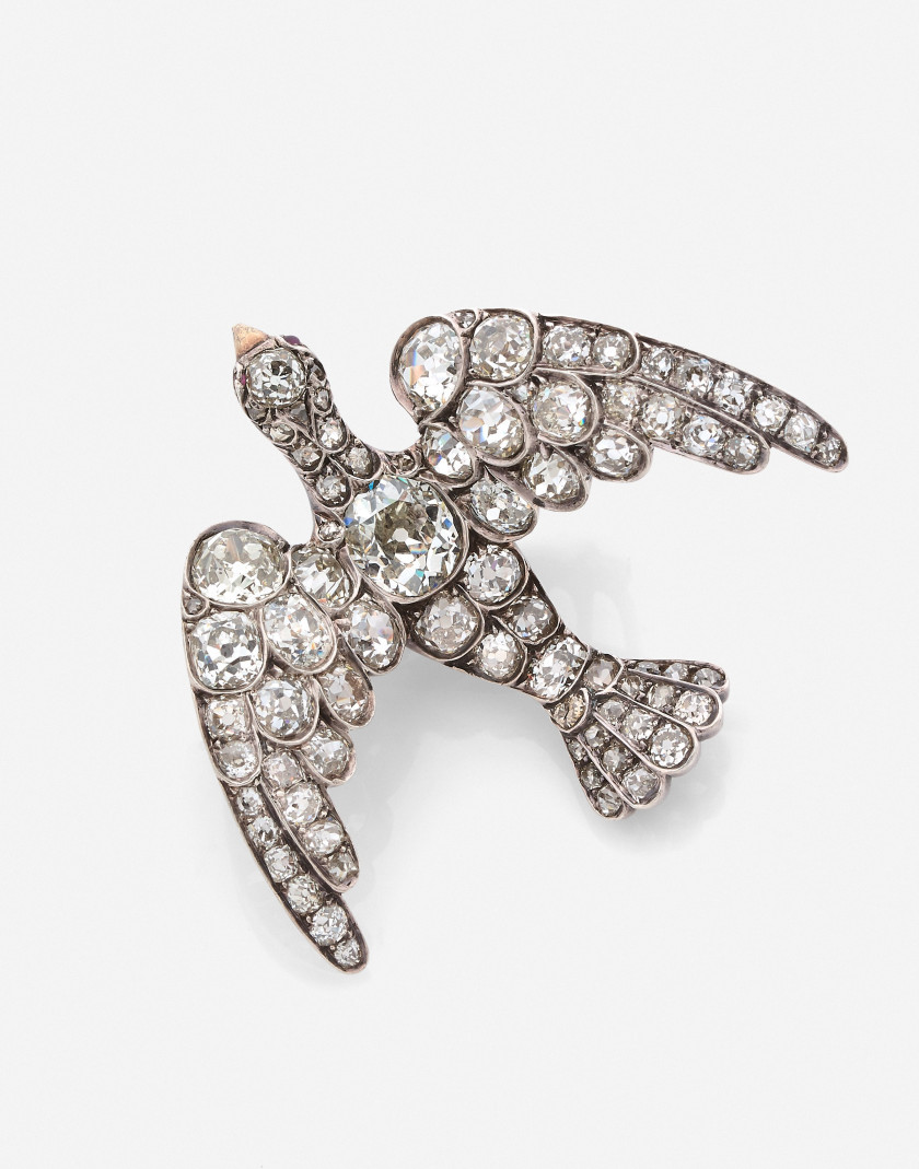 Broche oiseau en argent, or et diamants, début du XXe s. A diamond, silver and gold bird brooch beginning of the 20th cent.