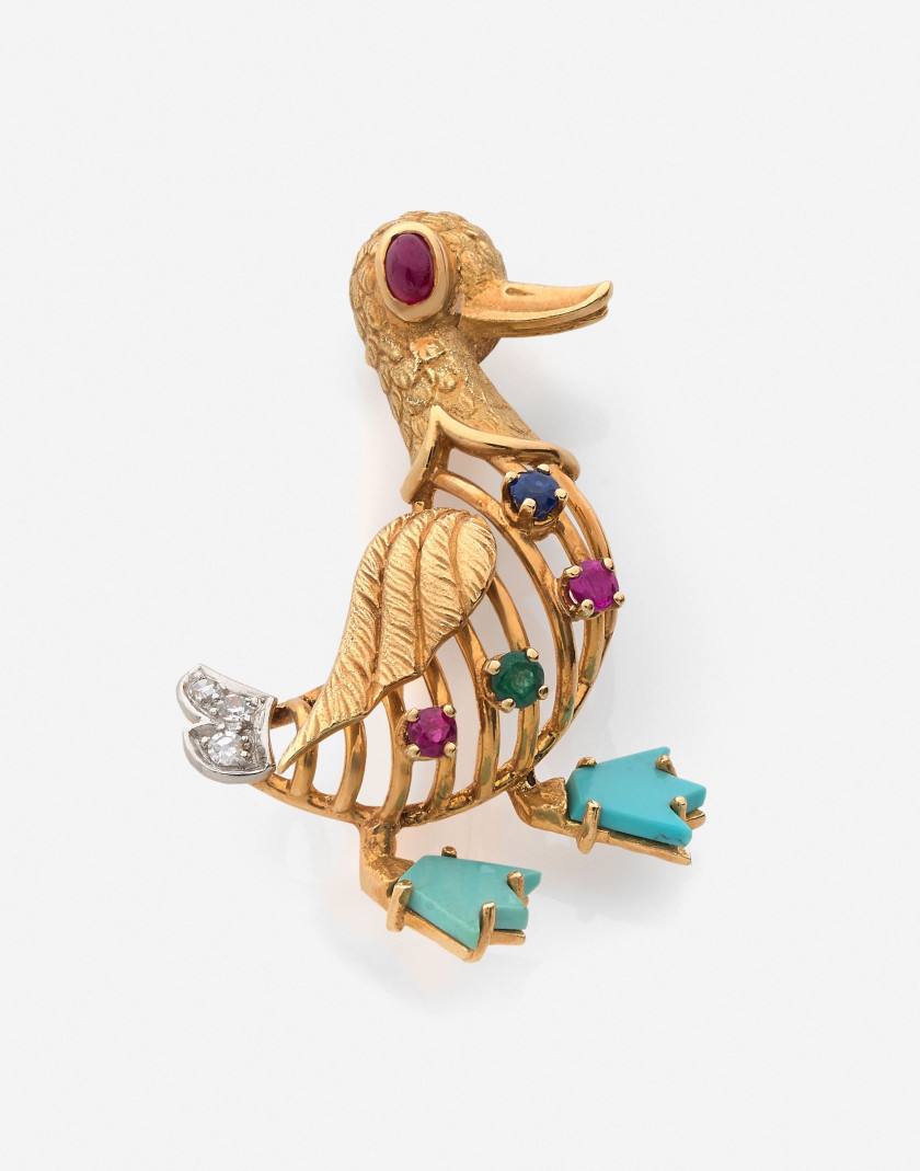 MAUBOUSSIN Clip or, platine, diamants, turquoise, rubis, saphir émeraude A diamond, sapphire, ruby, emerald, turquoise, gold and plati