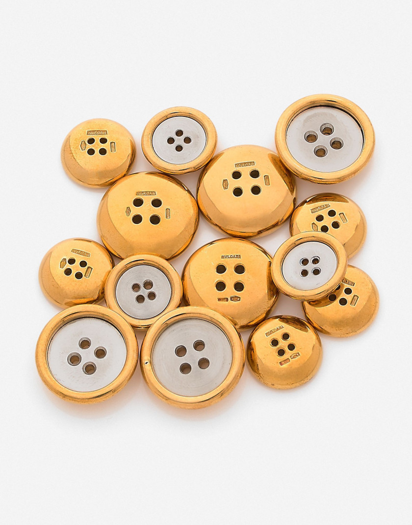 BULGARI Ensemble de 14 boutons or jaune et acier A set of 14 steel and yellow gold buttons