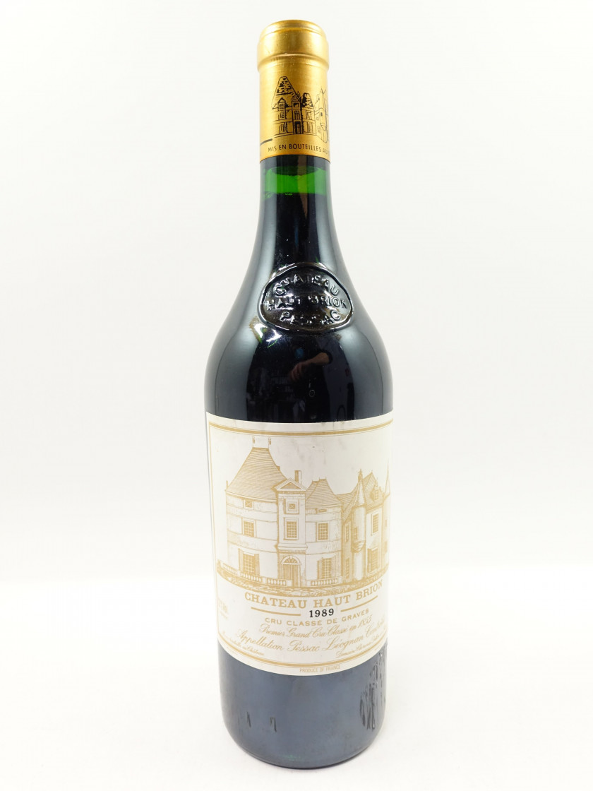 1 bouteille CHÂTEAU HAUT BRION 1989 1er GC Pessac Léognan (étiquette légèrement abimée)