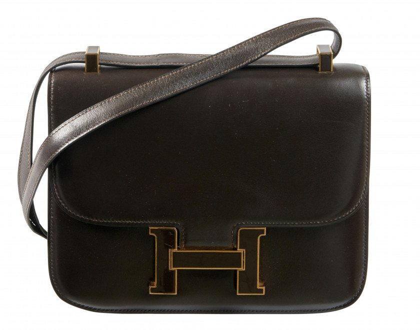 HERMÈS  Sac CONSTANCE 24 Box marron Garniture métal plaqué or et émail marron  CONSTANCE 24 bag Brown box calfskin lea...