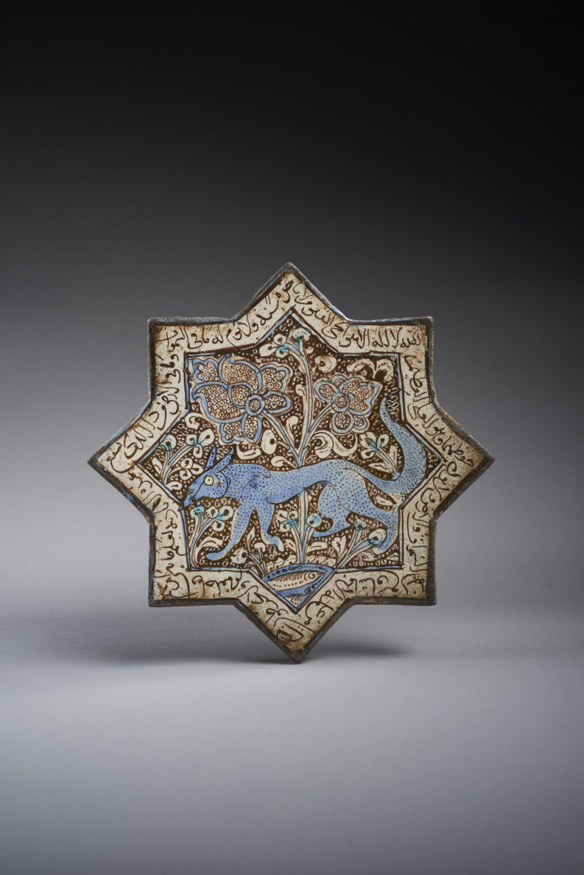 ÉTOILE DE REVÊTEMENT LUSTRÉE AU RENARD  Iran, probablement Kashan, art ilkhanide, deuxième moitié 13e-début 14e siècle