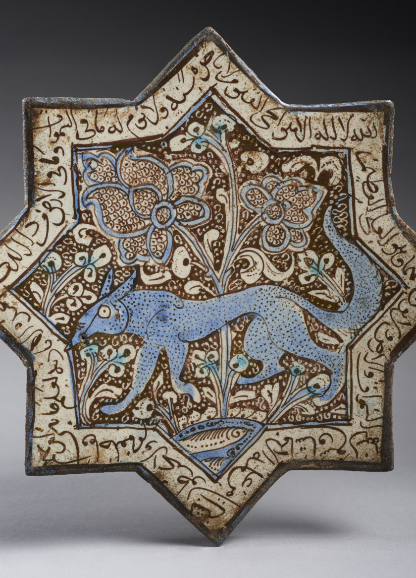 ÉTOILE DE REVÊTEMENT LUSTRÉE AU RENARD  Iran, probablement Kashan, art ilkhanide, deuxième moitié 13e-début 14e siècle